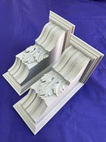 Pair of large reclaimed carved wooden painted acanthus corbels 