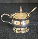 Silver-Plated Pot With Glass Liner And Spoon Silver plated condiment pot.