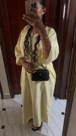 Yellow moroccan thobe with an opening pocket. One size  and oversized fit