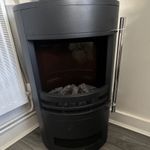 Freestanding Black Metal Heating Stove with Viewing Window & Glass Front Door