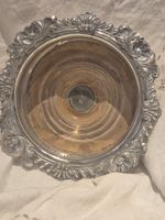 ANTIQUE SILVER PLATED WINE BOTTLE COASTER. FLORAL SCROLL BORDER. WOODEN  BASE