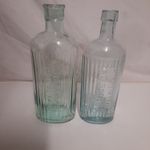 2 X Vintage Clear Blue Embossed Poison Bottles