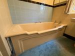 1950's butter yellow cast iron bath