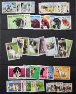 DOGS superb collection of 42 different stamps in complete sets