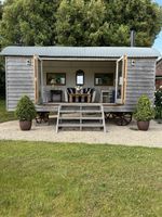 Shepherd’s Hut custom made.  Extra  large. Bifold doors, 1 yr old.  Hardly used.