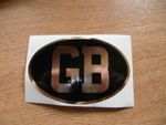Oval GB sticker - 100mm x 65mm - black & chrome decal