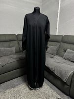 Black abaya with folded cuff sleeves.
