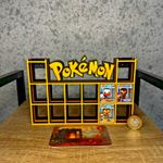 Display Shelf for Bitty Pop Pokemon theme black yellow 16 slots unit