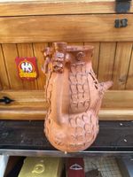 Amazing puzzle jug. Not only useful but huge fun. Made by a master potter.