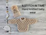 babies hand knitted cardigans