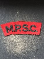 British Army Cloth Embroidered Shoulder Title M.P.S.C. (Military Provost Staff)