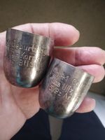 Two german solid silver cups with interesting engraving.