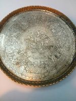 This item is a vintage Egyptian Revival hand-engraved brass tray