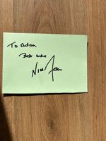 Nigel Farage signed piece of Green Card dedicated to Adam