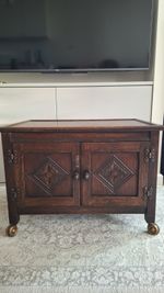 Antique oak chest of drawers in the neo-Gothic style