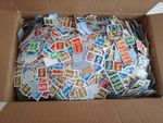 Kiloware used GB definitive stamps 1.68kg Closely Trimmed single backing paper