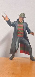 16 inch Freddy Krueger figure, no box or switch for speech, very good condition.