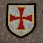 Red on White Crusader Cross Embroidered Shield Patch - 70mm high.