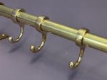Hanging pipe rail with closed sliding hooks- Made with polished brass-