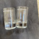  2x Stolichnaya  Russian Vodka vintage etched  shot glasses 8cm tall 5cm wide