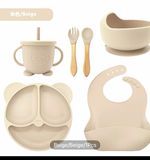 6-piece baby feeding set with bowl, sippy cup, and cartoon-themed plate.