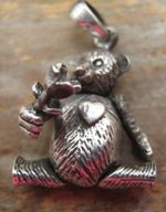A Sweet Articulated Solid Silver 925 Pendant Of Teddy Holding  A Flower
