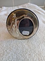 A Art Nouveau style sterling silver photo frame