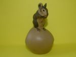 A Poole Pottery Mouse on an Apple