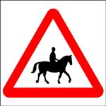 Accompanied horses or ponies likely to be in or crossing road ahead safety sign 