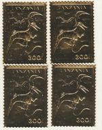 4 Gold Stamps Dinosaur Tanzania
