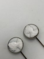 PAIR OF SWIVEL MOUNTED CAMEO ANTIQUE HAT PINS (A987)