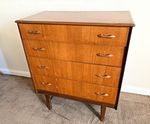 Mid-Century Wood 4 Drawer Chest of Drawers Brown Freestanding, wooden Handles.