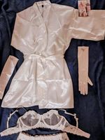 A shoot-worn signed outfit from the adult model Bryci. With signed photograph. 