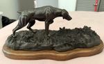 This item is a bronze sculpture of a German Shorthair pointer dog
