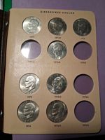 1971-1978 EISENHOWER DOLLAR STARTER SET. IN  DANSCO ALBUM (13)