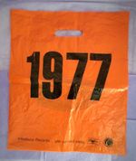 130.  Ash - 1977 - Promo Orange Plastic Carrier Bag Large 38x32cm. Imperfections