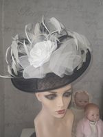 Unique Black And White Fascinator with Feathers Flowers and Sinamay Base