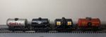 Rake of 4 Mixed Shell/BP Tanker Wagons - authentically used and worn