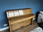 compact upright piano