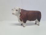 Beswick Hereford Bull Figurine. Bisque finish. 20 cms long