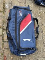 Cricket Bag Containing Helmet, Gloves, Bat, And Leg Pads