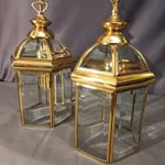 Lovely pair of vintage brass lanterns with bevelled glass panels.