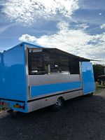 Iveco Daily blue food truck.