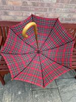 Nuage walking-length stick umbrella with a vibrant red Royal Stewart tartan