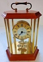 ROBERT BLANDFORD - GERMAN MADE QUARTZ BATTERY  MANTLE CLOCK - SPINNING BALLS.