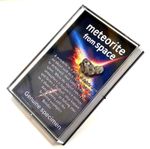 Authentic meteorite in display case - education & science - space rock