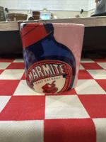 An Official Marmite Merchandise Pink Egg Cup, In Good Condition, 50mm Tall.