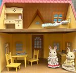 sylvanian  families house - 2 characters, bed , dresser, table , 2 chairs .