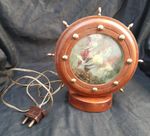 Vintage 1950s TV lamp featuring a nautical ship's wheel design. Wood and Brass