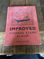 VINTAGE IMPROVED POSTAGE STAMP ALBUM 6750 SPACES Used